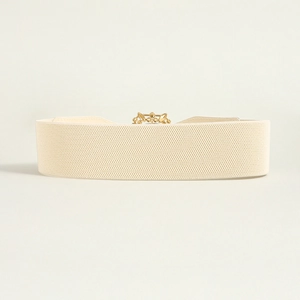 Detailed view of beige elastic fabric belt featuring a round gold-toned metal buckle