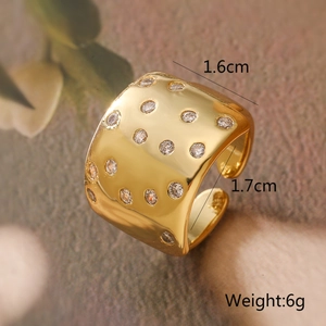 Detail view of 18K gold plated floral ring with zircon stones showing 1.6cm width