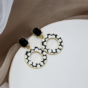 Retro gold-plated drop earrings with black rectangular stone and polka dot enamel hoops