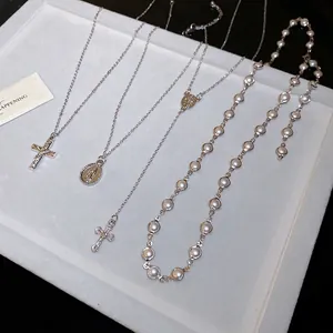 Y2K vintage cross and pearl necklace set with silver Virgin Mary oval pendants