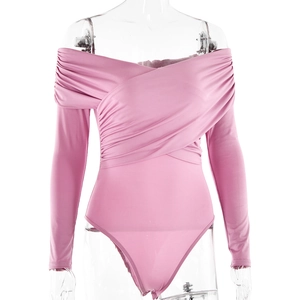 Detail showing the pleated off-shoulder neckline and smooth pink fabric of the bodysuit