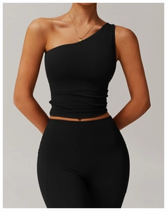 Detail of black one-shoulder yoga tank top with side pocket leggings for fitness