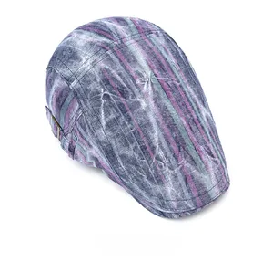 Overhead view of vintage striped ivy cap with purple, green, and gray distressed fabric