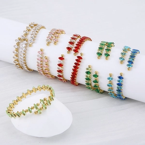 Detail of 18K gold-plated bangle featuring multi-color marquise-cut zircon stones