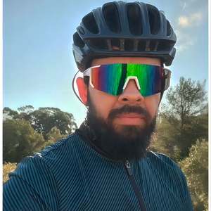 Outdoor cycling sports kit featuring stylish rainbow sunglasses and black aerodynamic helmet