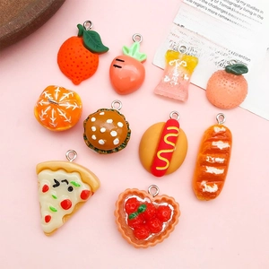 Nine piece set of resin food charms featuring hamburger and orange for DIY jewelry making