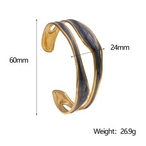 Detailed dimension view of gold-plated wavy bangle with gray enamel inlay details