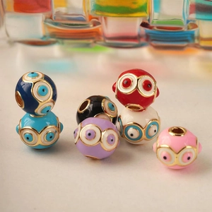 Colorful evil eye enamel beads for DIY jewelry making with gold plated metal borders