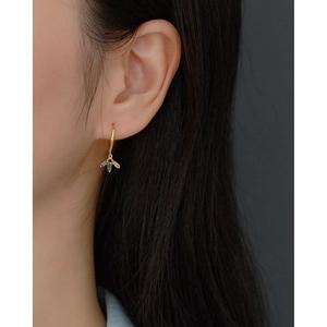 S925 silver gold-plated earrings with colorful zircon stone charms on a female model
