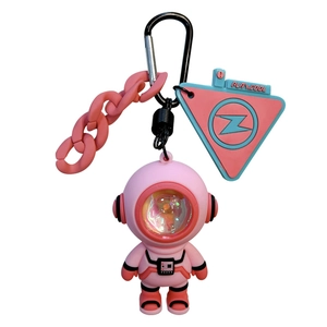 Creative pink astronaut keychain featuring glowing visor atmosphere light and stylish carabiner