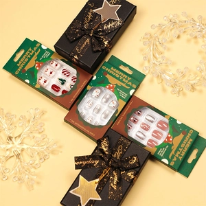 Christmas theme soft gel press-on nail kits with reindeer and snowflake glitter designs