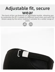 Detail of black winter cap showing adjustable silver buckle for custom secure fit