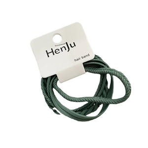 Deep green braided elastic hair band set displayed on a white branded display card