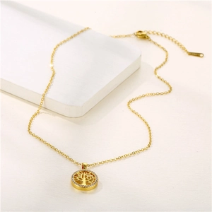 Golden stainless steel tree of life necklace with zircon inlay on white stone