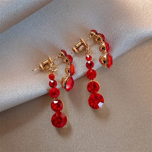 Red crystal drop earrings with four gradient round stones in gold-plated settings