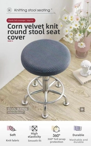 Close-up of a dark grey round stool cover in elastic corn fleece fabric on a stool