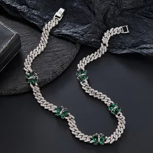 Silver Cuban link necklace with emerald green butterfly pendants and zircon stones