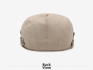 Back view of beige cotton duckbill cap showing metal buckles and reinforced stitching