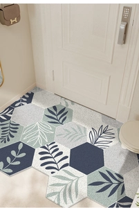 Détail du tapis en PVC de style nordique avec motif de feuilles bleues et blanches
