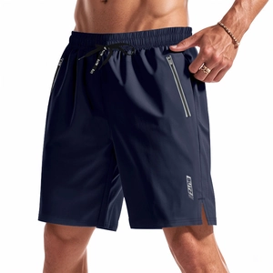 Men's loose quick-dry sports shorts in dark blue with drawstring waist and zipper pockets
