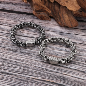 Gothic skull head curb chain bracelet for men in antique silver and gun black finish