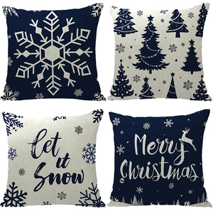Set of four Christmas linen pillow covers with reindeer and snowflake prints