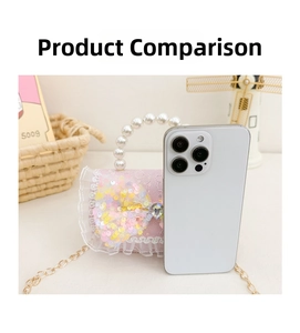 Pink lace crossbody bag with pearl handle shown next to a phone for size comparison