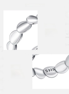 Macro detail showing S925 hallmark on hand-polished irregular silver link ring