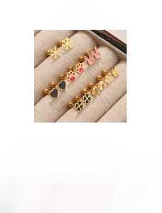 Détails du lot de boucles d'oreilles en acier titane doré avec motifs trèfle et cœur