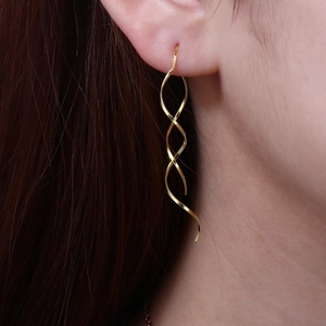 Elegant gold S925 silver spiral long tassel threader earrings shown on model