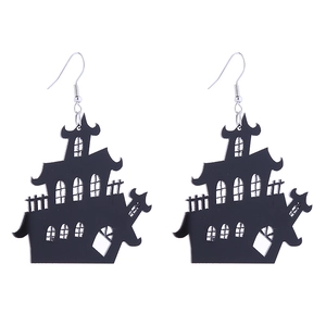 Close-up of black acrylic haunted house earrings for Halloween featuring silver metal hooks