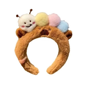 Cute brown plush caterpillar headband for women with colorful fuzzy pom-pom decorations