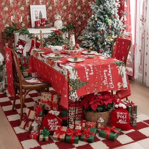 Christmas tablecloth set with red Merry Christmas print and festive decor accessories