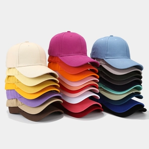 Solid color hard top baseball caps displayed in various vibrant colors on grey background
