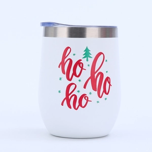 Detail of 12oz white stainless steel egg cup with festive ho ho ho and Christmas tree print