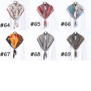 Multiple geometric print silk-like scarves displayed in a grid with model numbers