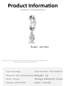 Detail of 925 sterling silver hoop earrings with round cubic zirconia stone setting