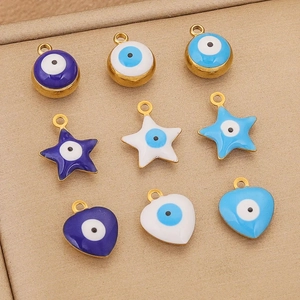 Enamel evil eye charms in round star and heart shapes with gold stainless steel frames