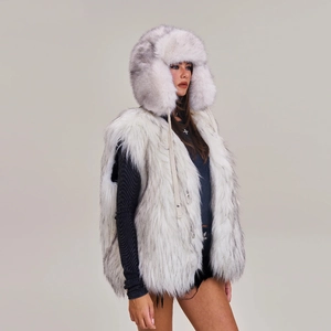 Detailed view of the fluffy white and grey gradient faux fur vest with matching trapper hat