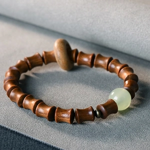 Green sandalwood bamboo joint bead bracelet with glowing bead and wooden ring accessory