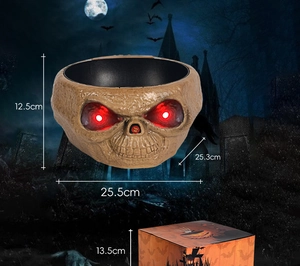 Animated Halloween skull candy bowl with glowing red eyes and detailed size measurements
