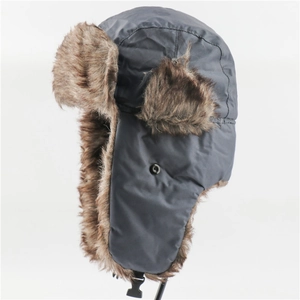 Close-up of waterproof windproof trapper hat with dark grey fabric and brown faux fur lining