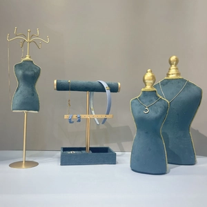 Dark green velvet jewelry display set with gold metal stand for necklaces and earrings