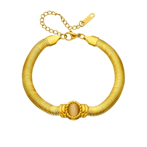 Elegant gold-plated stainless steel wide herringbone chain bracelet with oval cat eye stone
