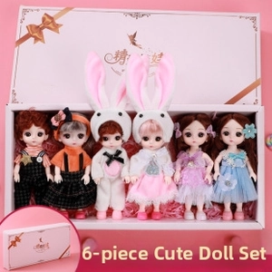 Detailed view of 6-piece cute doll set in a premium pink gift box for little girls