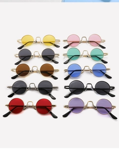 Matrix display of vintage round metal sunglasses in ten diverse lens colors and frames