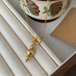 Elegant 925 silver gold-plated ball pendant necklace with three spheres in minimalist style