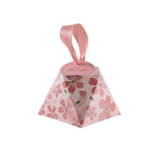 Pink pyramid-shaped cherry blossom candy box with a ribbon handle and thank you tag