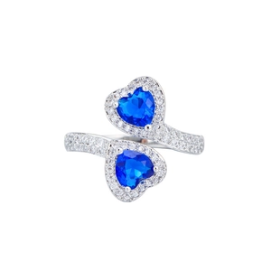 Silver open ring featuring double blue sapphire hearts with micro-pave cubic zirconia