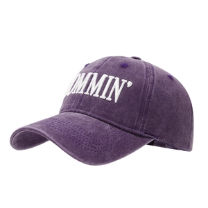 Deep purple washed cotton baseball cap with white MOMMIN embroidery in a side 45-degree view